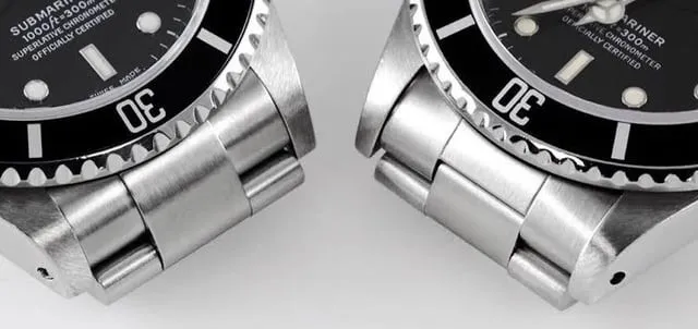 Side-by-side Submariner bracelet end-links comparison: solid vs folded construction