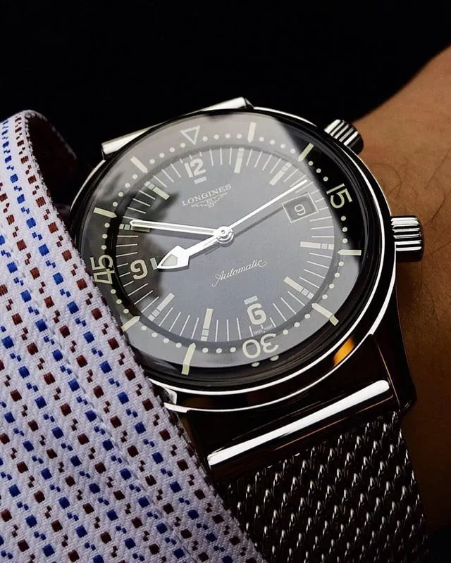 Longines Legend Diver three-quarter angle showing domed crystal and internal bezel.