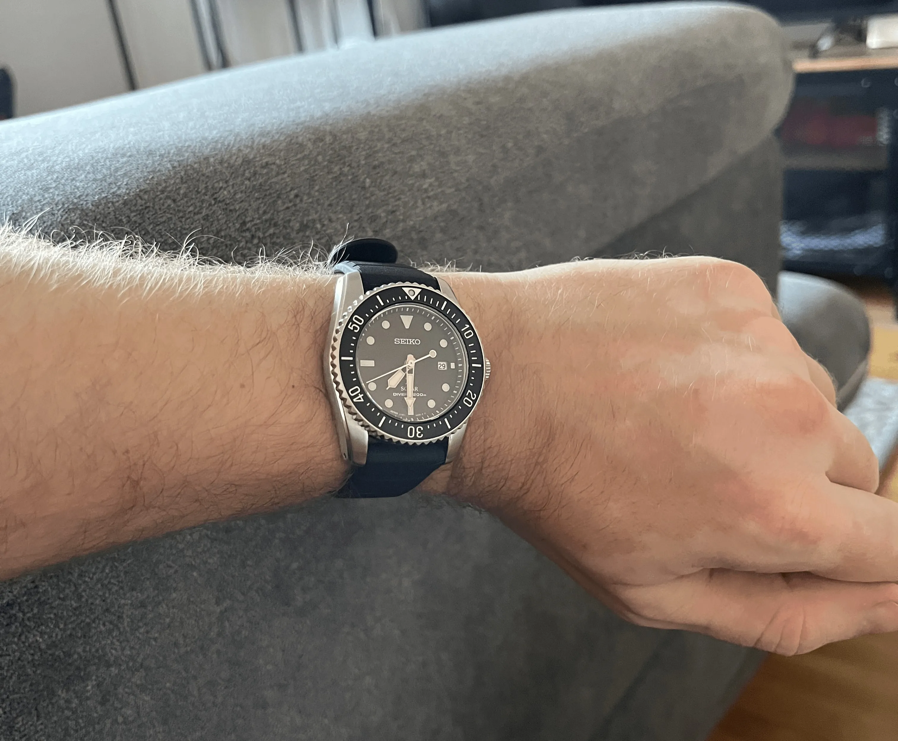 Seiko Prospex Solar diver on wrist, lugs visibly overhanging both wrist edges