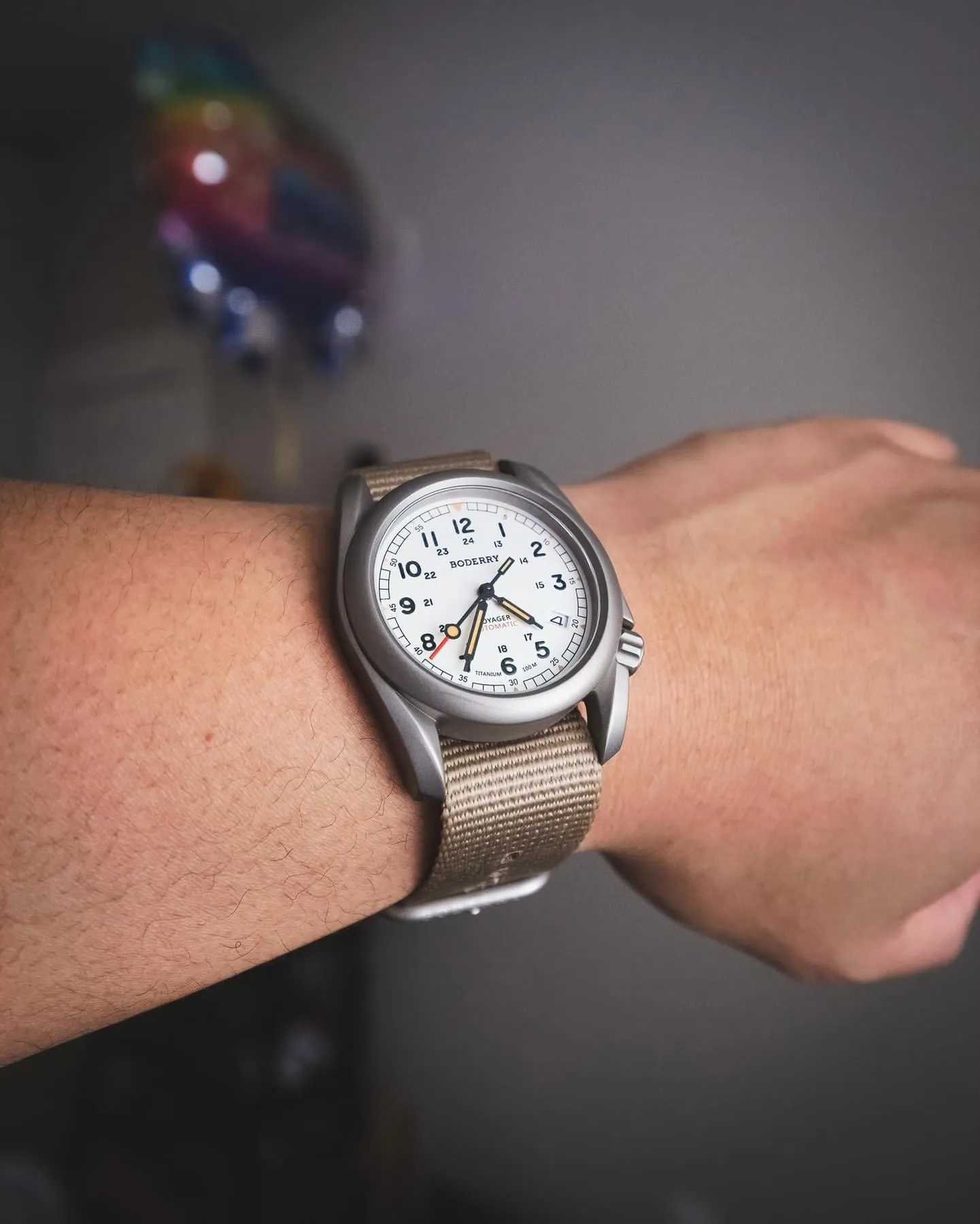 Boderry Voyager field watch on wrist with lug tips visibly extending to wrist edges.